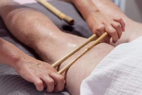 Massage aux Bambous